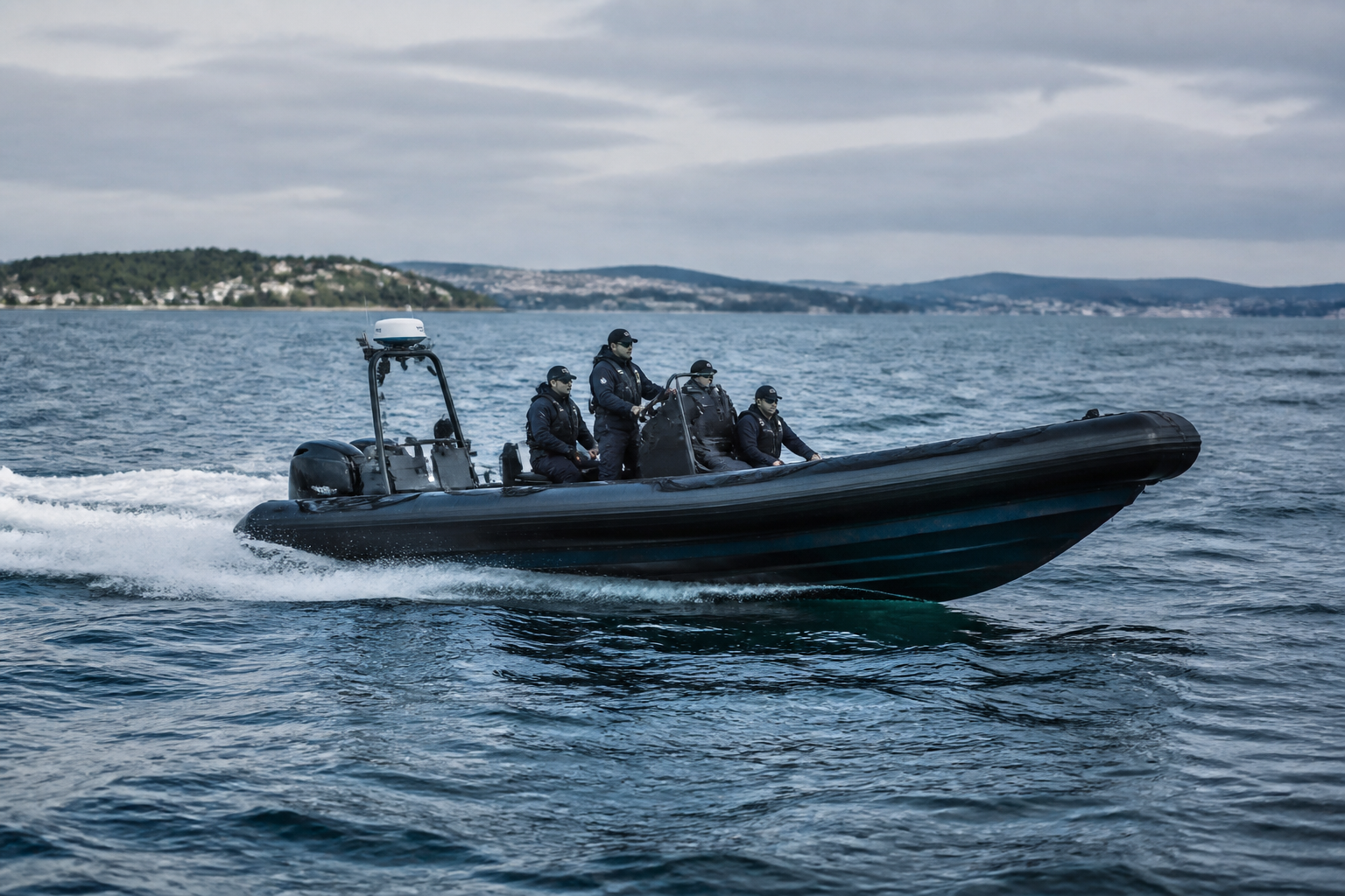 Crew aboard a rigid inflatable boat at sea